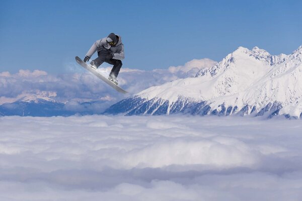 DIMEX | Vliesové fototapety na stenu Lietajúci snowboardista MS-5-1570 | 375 x 250 cm | modrá, biela