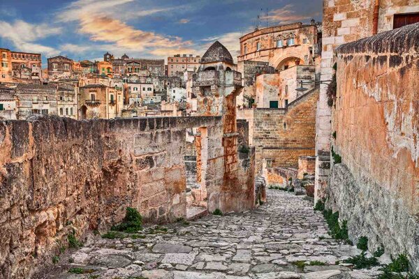 DIMEX | Vliesové fototapety na stenu Mestečko Matera MS-5-0692 | 375 x 250 cm | modrá, oranžová, šedá
