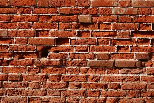 DIMEX | Vliesové fototapety na stenu Rozpadnutý tehlový múr MS-5-2665 | 375 x 250 cm | oranžová