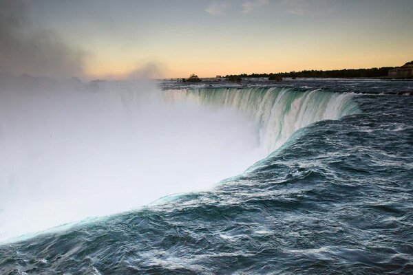 DIMEX | Vliesové fototapety na stenu Horseshoe Falls, Wales MS-5-3176 | 375 x 250 cm | modrá, biela