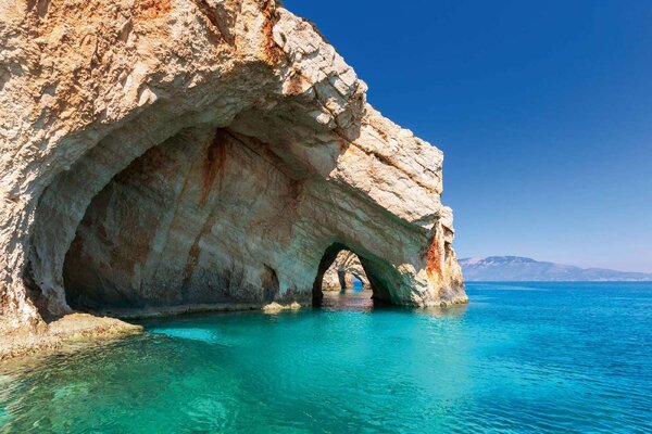 DIMEX | Vliesové fototapety na stenu Ostrov Zakynthos MS-5-3132 | 375 x 250 cm | zelená, modrá, hnedá