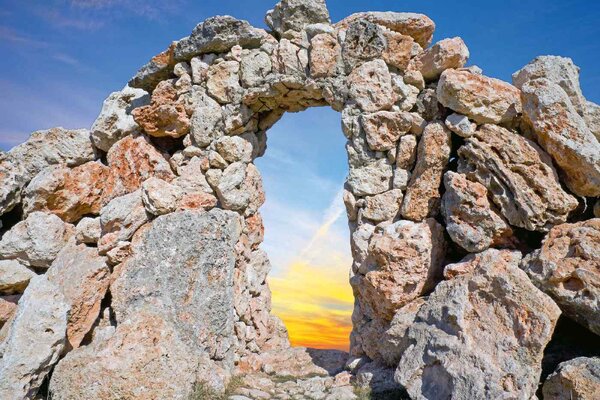 DIMEX | Vliesové fototapety na stenu Okno v skale MS-5-1675 | 375 x 250 cm | modrá, hnedá, šedá