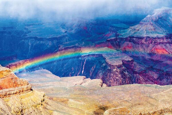DIMEX | Vliesové fototapety na stenu Dúha nad Grand Canyonom MS-5-3022 | 375 x 250 cm | modrá, červená, fialová, žltá, hnedá