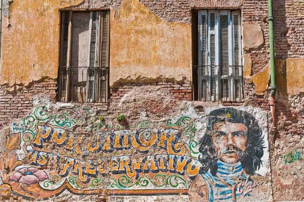 DIMEX | Vliesové fototapety na stenu Che Guevara graffiti MS-5-0796 | 375 x 250 cm | žltá, oranžová, hnedá