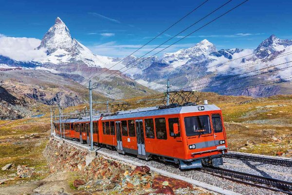 DIMEX | Vliesové fototapety na stenu Zermatt, Švajčiarsko MS-5-2895 | 375 x 250 cm | modrá, červená, biela