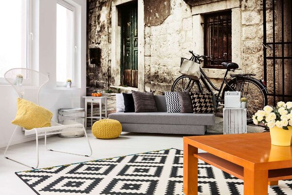 DIMEX | Vliesové fototapety na stenu Bicykel pri kamennom múre MS-5-1213 | 375 x 250 cm | čierna, krémová, hnedá