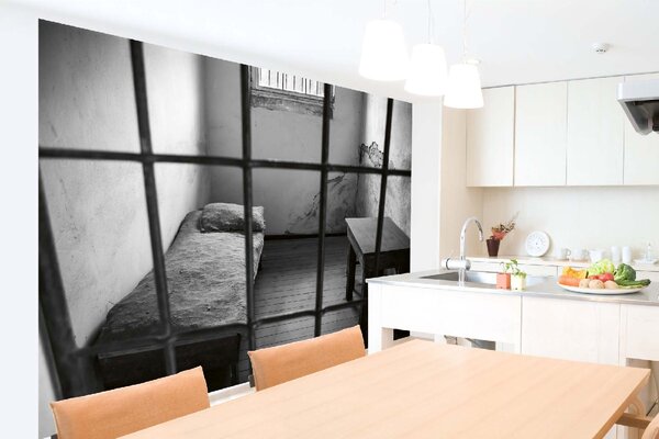 DIMEX | Vliesové fototapety na stenu Posteľ vo vnútri cely MS-5-0959 | 375 x 250 cm | biela, šedá