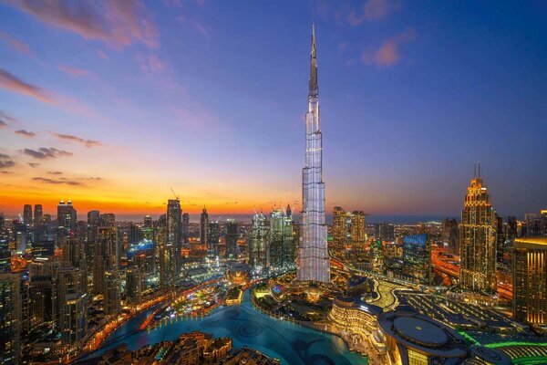 DIMEX | Vliesové fototapety na stenu Burj Chalifa, Dubai MS-5-1214 | 375 x 250 cm | modrá, žltá, oranžová, šedá