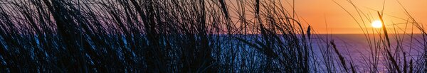 DIMEX | Fototapeta do kuchyne Západ slnka nad oceánom KI-350-203 | 350 x 60 cm | modrá, čierna, oranžová