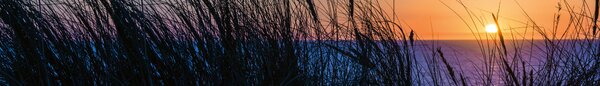 DIMEX | Fototapeta do kuchyne Západ slnka nad oceánom KI-420-203 | 420 x 60 cm | modrá, čierna, oranžová