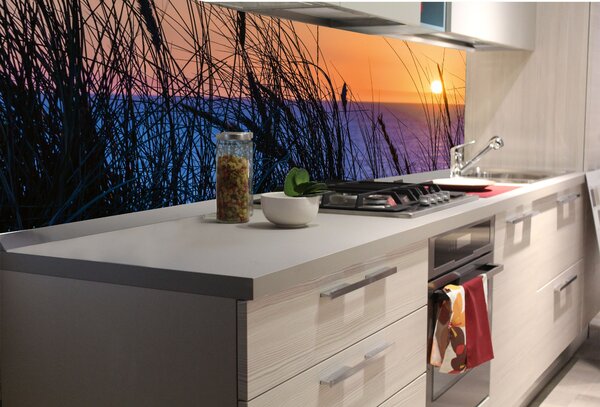 DIMEX | Fototapeta do kuchyne Západ slnka nad oceánom KI-180-203 | 180 x 60 cm | modrá, čierna, oranžová