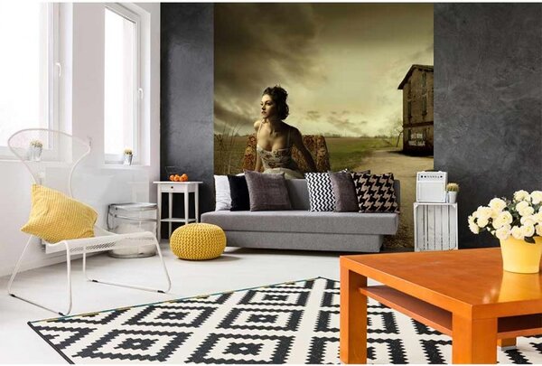 DIMEX | Vliesová fototapeta na stenu Dievča v kresle MS-3-0258 | 225 x 250 cm | béžová, zelená