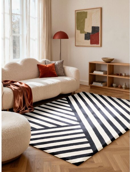 Čierno-biely ručne tkaný vlnený koberec 120x180 cm Stryve Noir – Elle Decoration