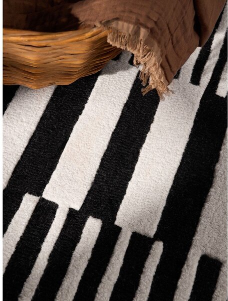 Čierno-biely ručne tkaný vlnený koberec 120x180 cm Stryve Pulse – Elle Decoration