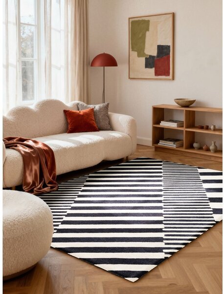Čierno-biely ručne tkaný vlnený koberec 120x180 cm Stryve Flux – Elle Decoration