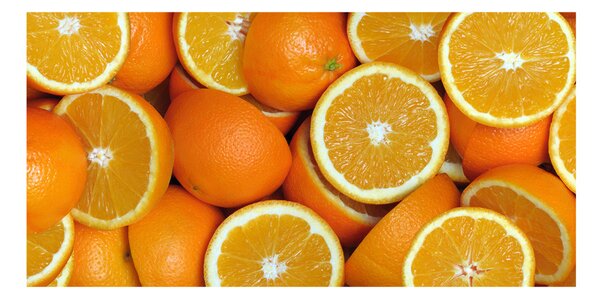 Foto obraz sklenený horizontálny polovičky pomarančov