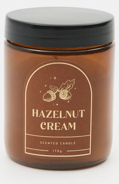 Sinsay - Voňavá sviečka Hazelunt Cream - zlatohnedá