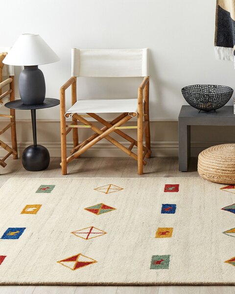 Koberec gabbeh béžový vlna 160 x 230 cm geometrický zvierací vzor ručne všívaný tradičný boho štýl obývacia izba spálňa